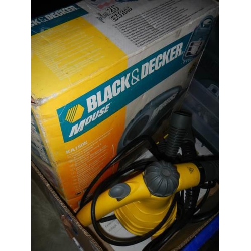 990L - A boxed Black and Decker 'Mouse'sander and a steam cleaner.