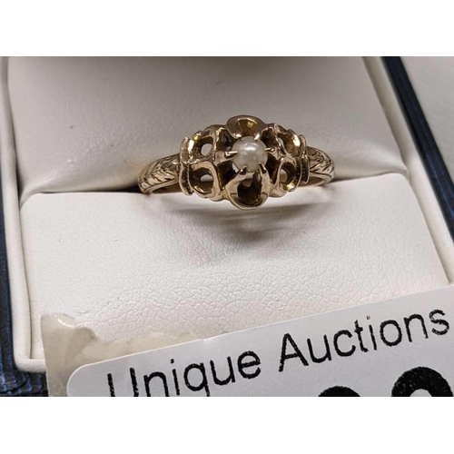 1003 - A 9ct gold ring set seed pearl, size L, 2.3 grams, Hall Marked rubbed.