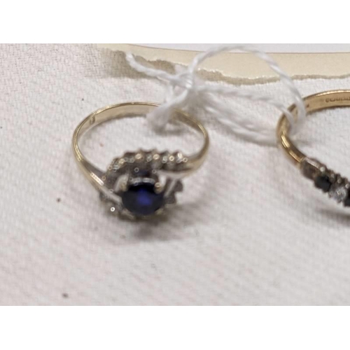 1012 - An 18ct gold blue/white stone cluster ring and a blue and white stone wishbone ring, sizes l & V, 5 ... 