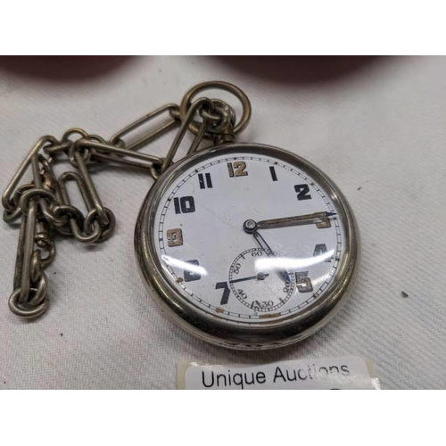 1013 - A military issue pocket watch on chain marked GS/TP, serial number 034923