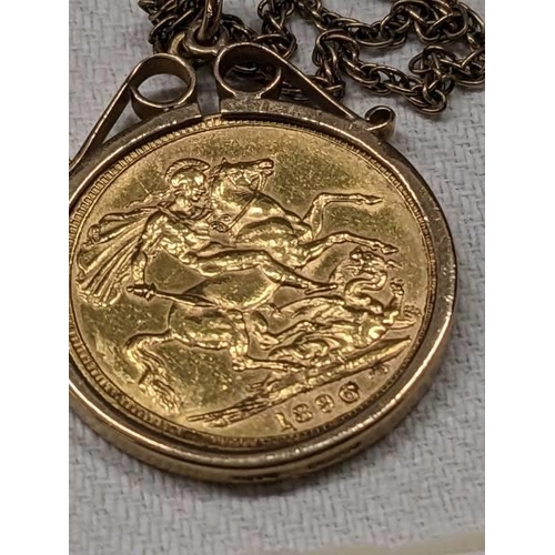 1017 - An 1896 Victoria Old Head gold sovereign on a 9ct gold chain, total weight 14.9 grams.