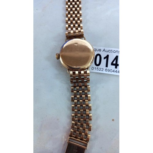 1014 - A 9ct gold Omega wrist watch on a 9ct gold bracelet, in working order, total weight 49.4 grams.