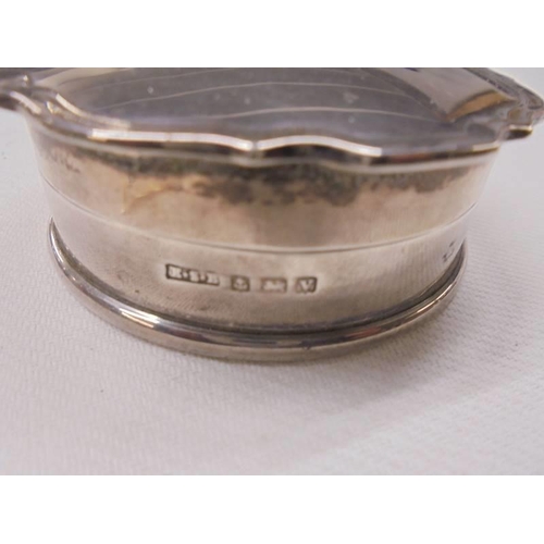 1039 - A hall marked silver trinket box with coat of arms 'S.S.Ormuz' 38 grams and a glass silver topped tr... 