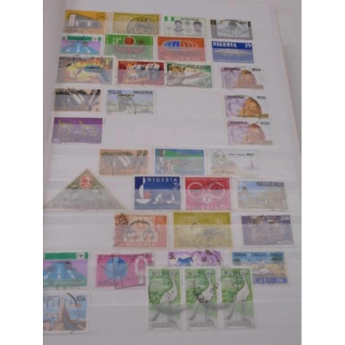 1055 - Five albums of UK and Commonwealth stamps including Victorain.