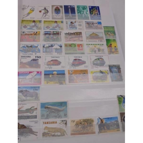 1055 - Five albums of UK and Commonwealth stamps including Victorain.