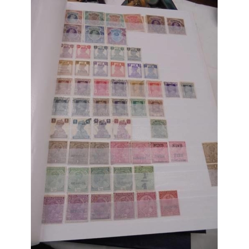 1055 - Five albums of UK and Commonwealth stamps including Victorain.