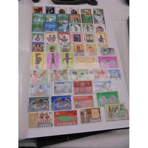 1055 - Five albums of UK and Commonwealth stamps including Victorain.