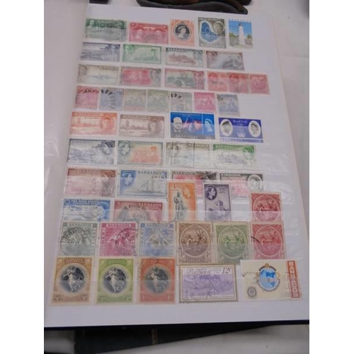 1055 - Five albums of UK and Commonwealth stamps including Victorain.