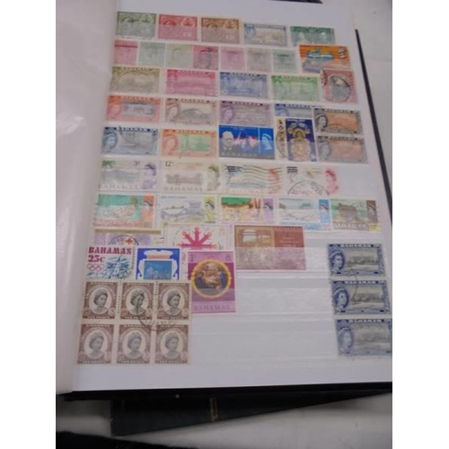 1055 - Five albums of UK and Commonwealth stamps including Victorain.