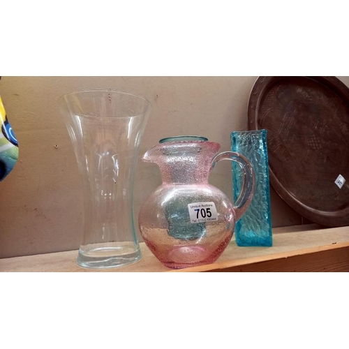 705 - A quantity of coloured glass vases/jugs