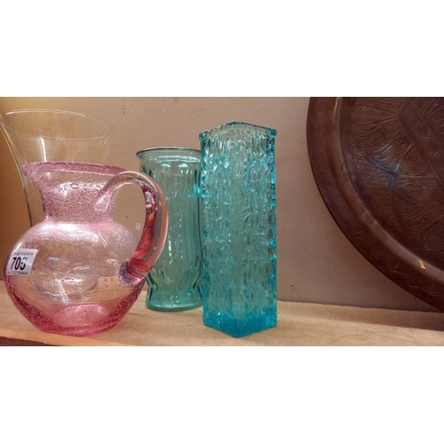 705 - A quantity of coloured glass vases/jugs