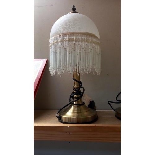 713 - A pair of antiqued brass table lamps 1 with shade