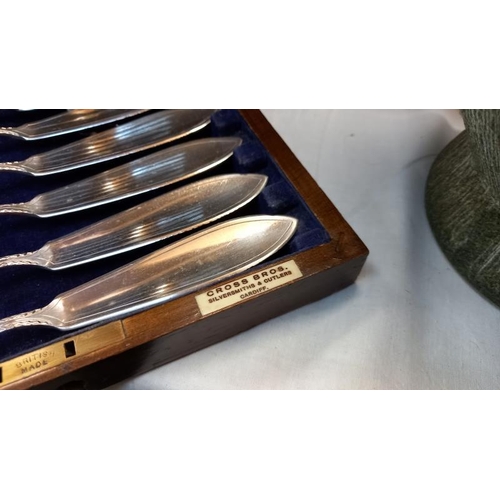 730 - An oak cased silver plate set of fish knives and forks by Cross Bros Cardiff