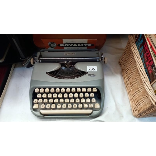 735 - A vintage Royal Royalite typewriter with travel case