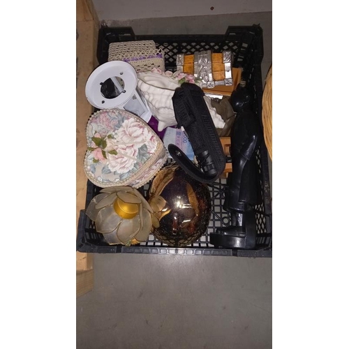 750 - A box of miscellaneous items including a gilded skull money box, figure of Tin Tin