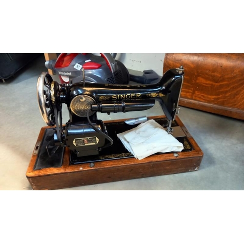 762 - A cased vintage Singer sewing machine  COLLECT ONLY