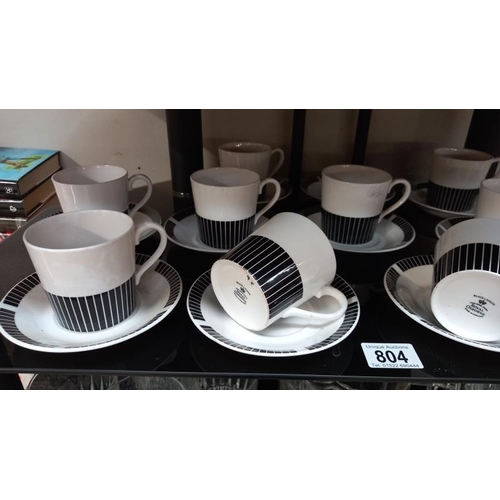 804 - A Royal Osborne black and white tea set, (11 cups, 12 saucers)