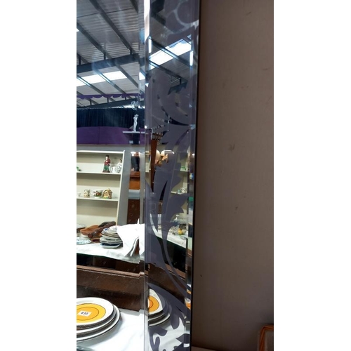 828 - A large bevel edged mirror with bevelled edge etch mirror frame, 79cm x 109cm COLLECT ONLY