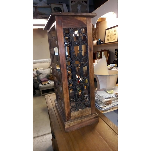 833 - A teak bottle cabinet with wrought iron sides, 47cm x 29cm x 80cm COLLECT ONLY