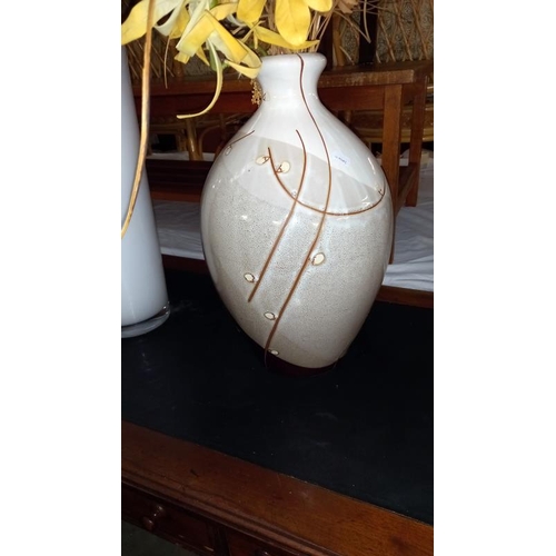 858 - A Bulbous pottery & a tall glass vase with dried flowers, COLLECT ONLY