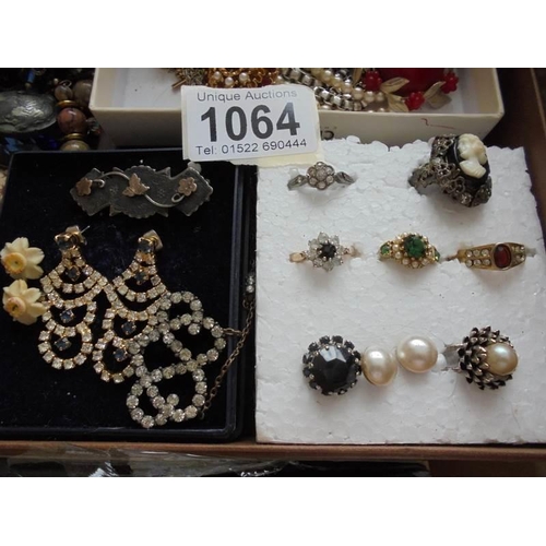 1064 - A mixed lot of old jewellery including silver and old paste items, three graces cameo, child's silve... 