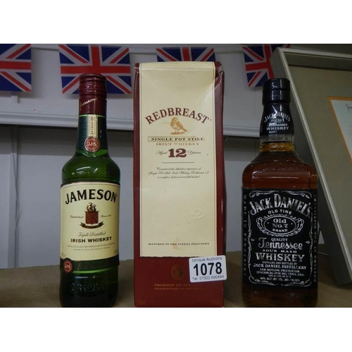 1078 - Three bottles of whisky - Redbrest, Jamesons and Jack Daniels.