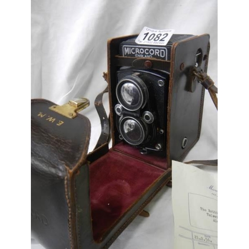 1082 - A good leather cased Microcord camera.