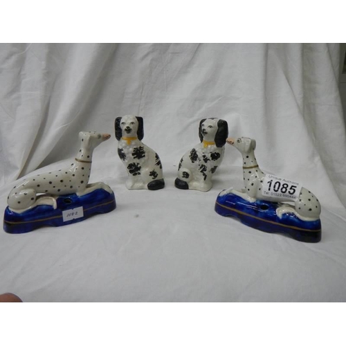 1085 - A pair of Samson style Dalmation pen stands and a small pair of Staffordshire spaniels.