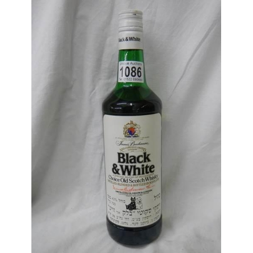 1086 - A bottle of Black & White Old Scotch Whisky,.