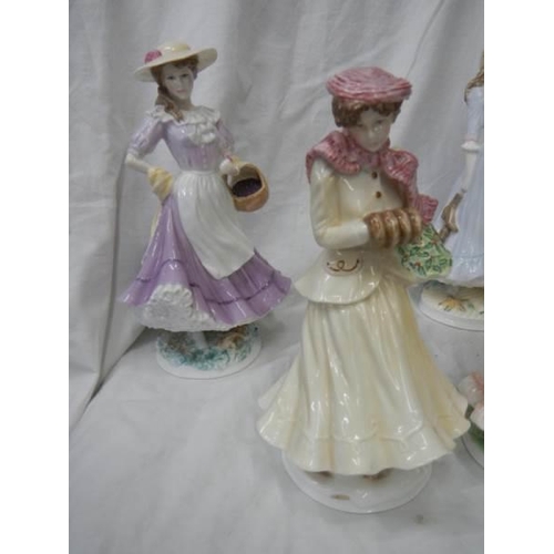 1087 - A set of four limited edition Royal Worcester Four Seasons figurines.