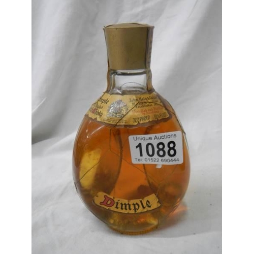 1088 - A bottle of 60 year old Dimple whisky.