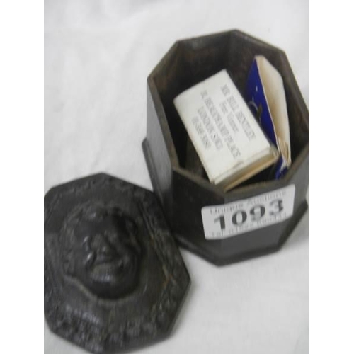 1093 - A mid Victorian cast iron tobacco box.