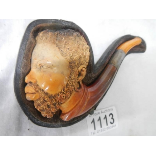 1113 - An old cased Meerscham pipe of a man's head.