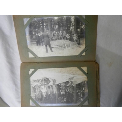 1125 - An antique postcard album containing many historical photographs and postcards.