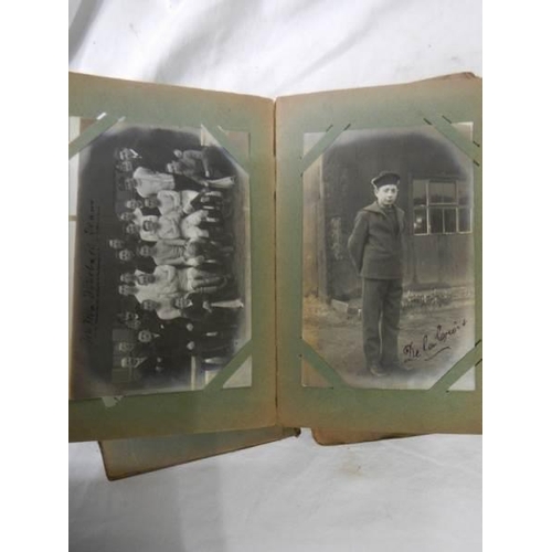 1125 - An antique postcard album containing many historical photographs and postcards.