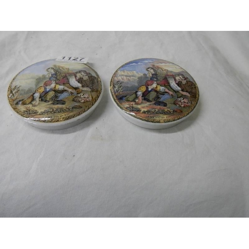 1127 - Two antique pot lids.