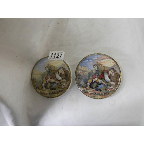 1127 - Two antique pot lids.