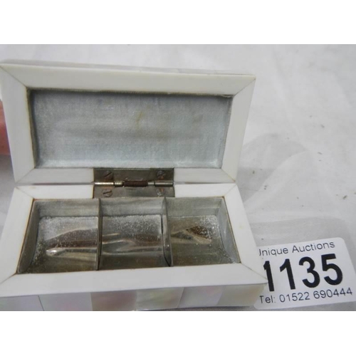 1135 - A mother of pearl stamp box, in good condition.