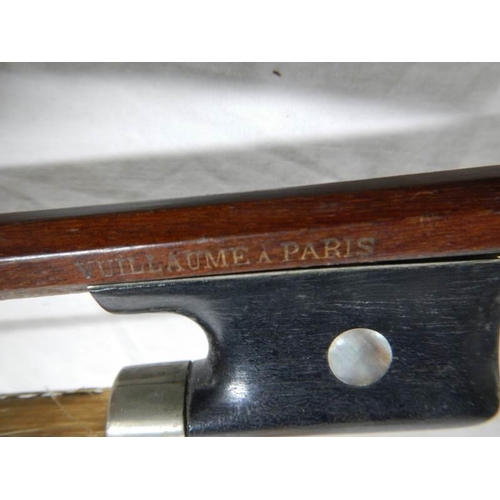 1137 - A violin bow stamped Vuillaume A Paris.