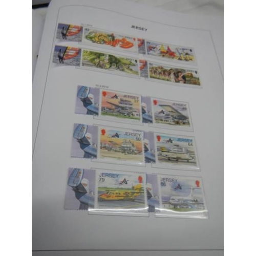 1146 - Three albums of mainly Jersey stamps.