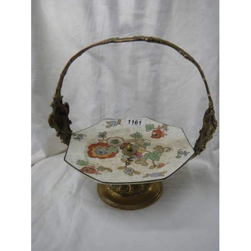 1161 - A WMF brass mounted cake stand with ceramic cake plate.