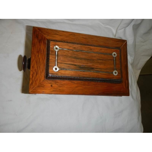 1171 - A Victorian rosewood tea caddy in very good condition.