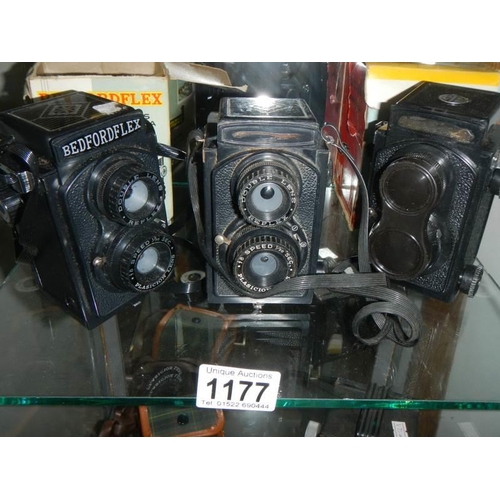 1177 - Three vintage camera's.