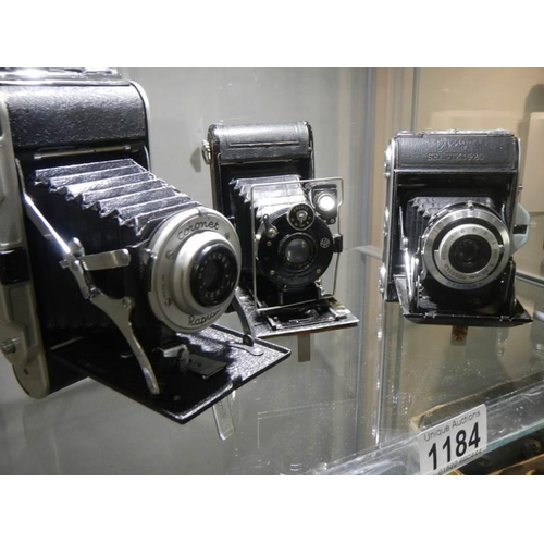 1184 - Three good vintage folding camera's.