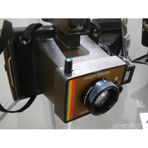 1185 - Two vintage folding camera's and a Polaroid camera.