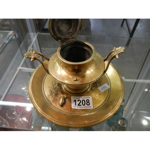 1208 - A Victorian brass inkwell.