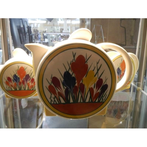 1215 - A Moorland Chelsea works Burslem crocus pattern Clarice Cliff style tea set.