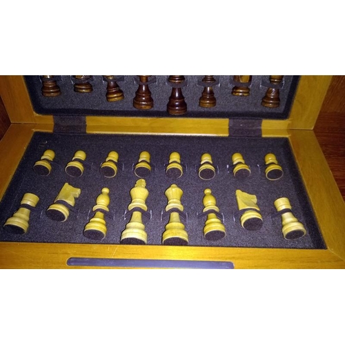 972 - An inlaid folding chess board & chess pieces