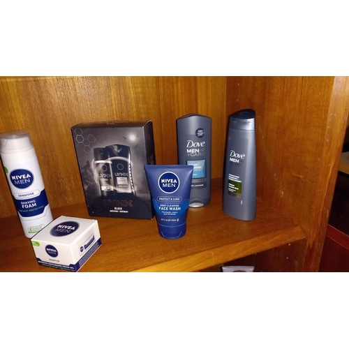 974 - 2 shelves of men & women's toiletries (Mainly unused)