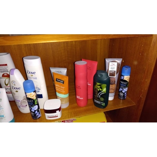 974 - 2 shelves of men & women's toiletries (Mainly unused)